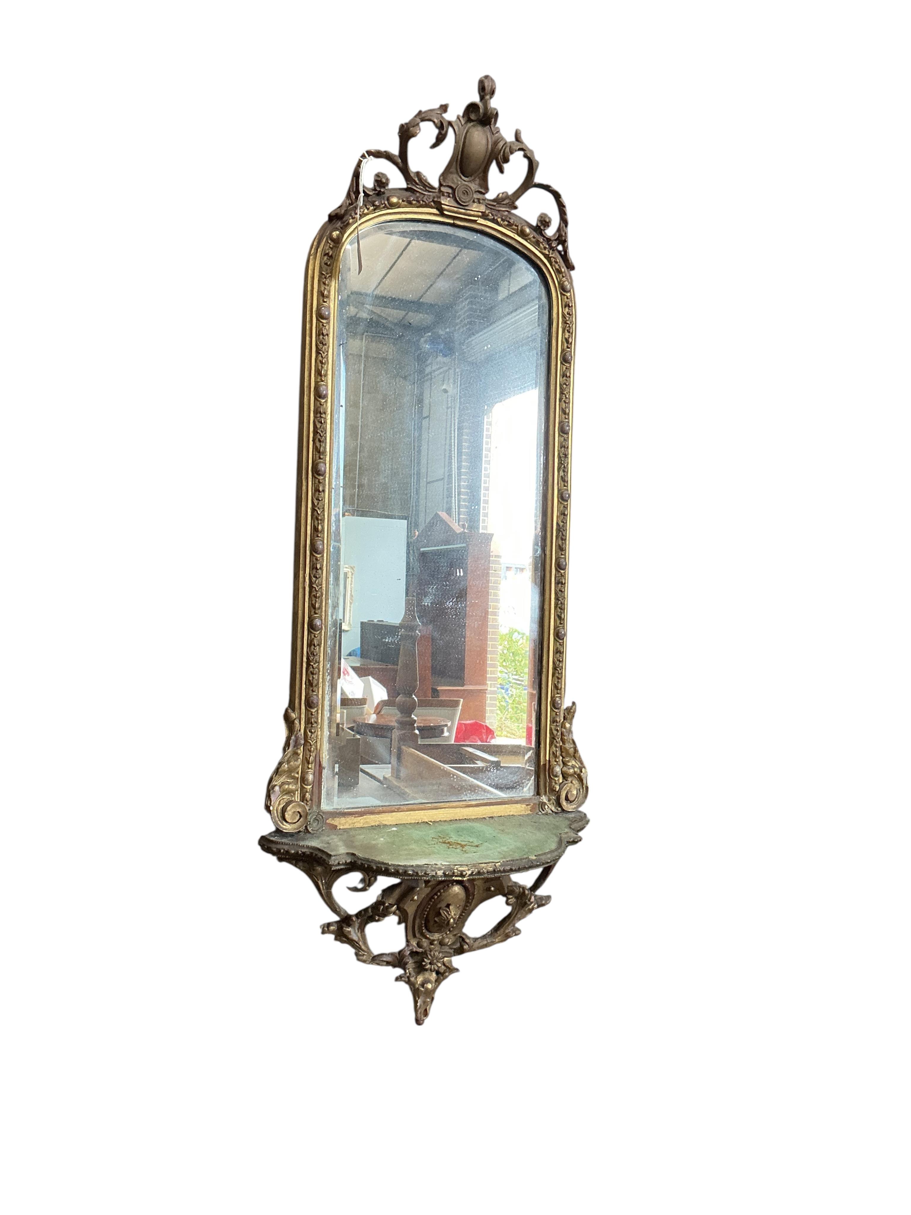 A Victorian giltwood and composition wall mirror, width 38cm, height 98cm